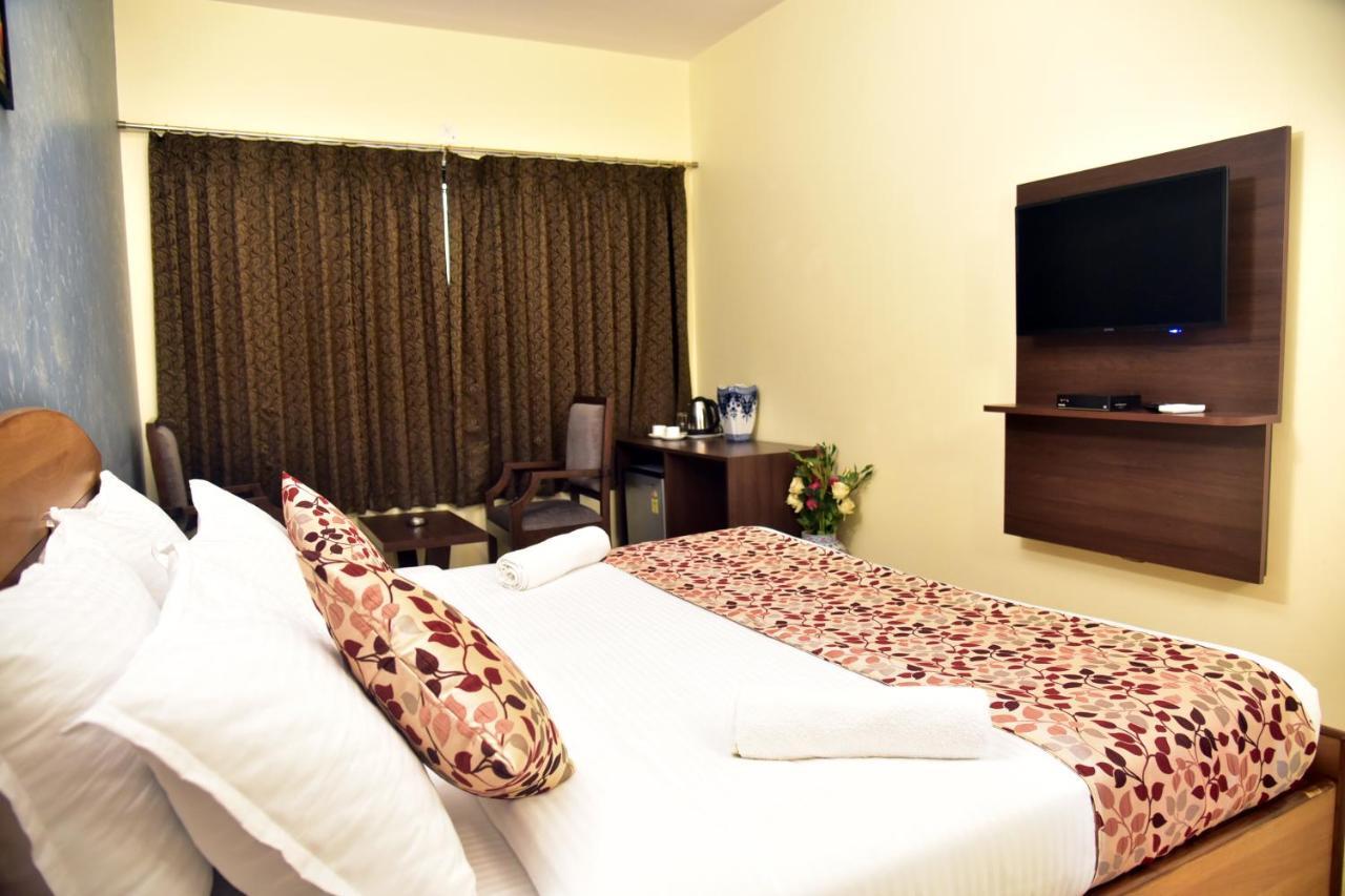 Candolim Grande Resort Bagian luar foto