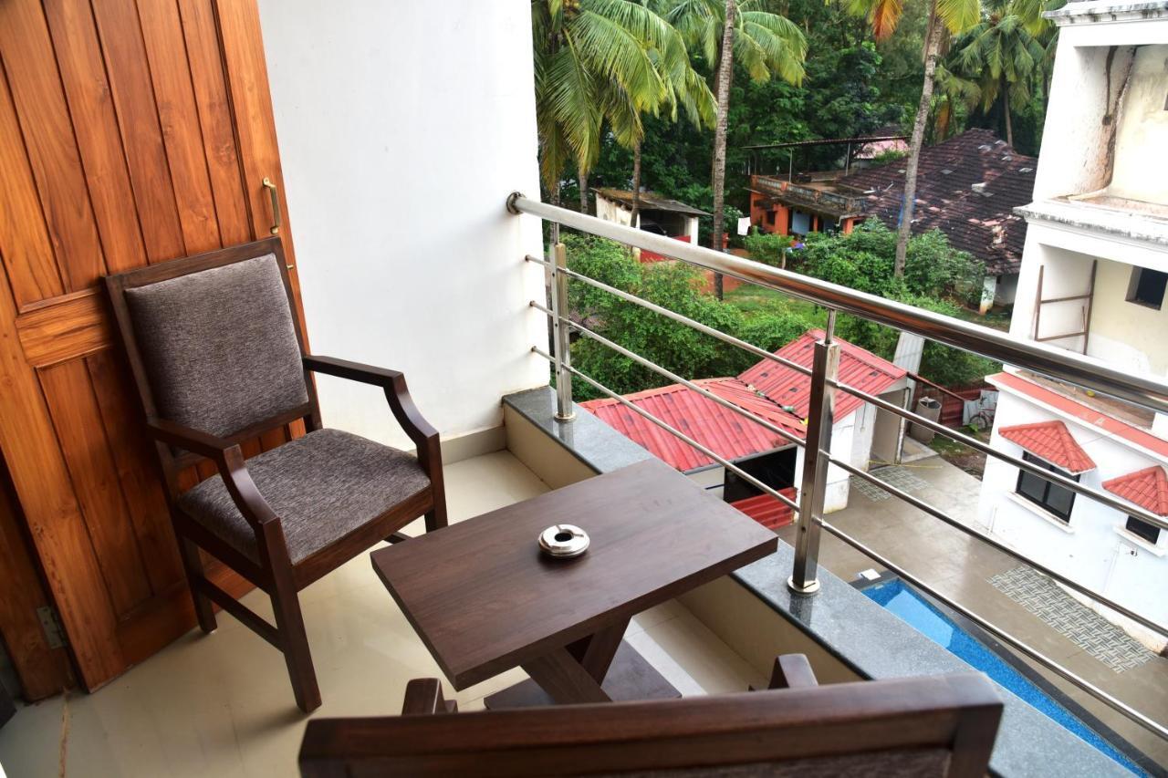 Candolim Grande Resort Bagian luar foto