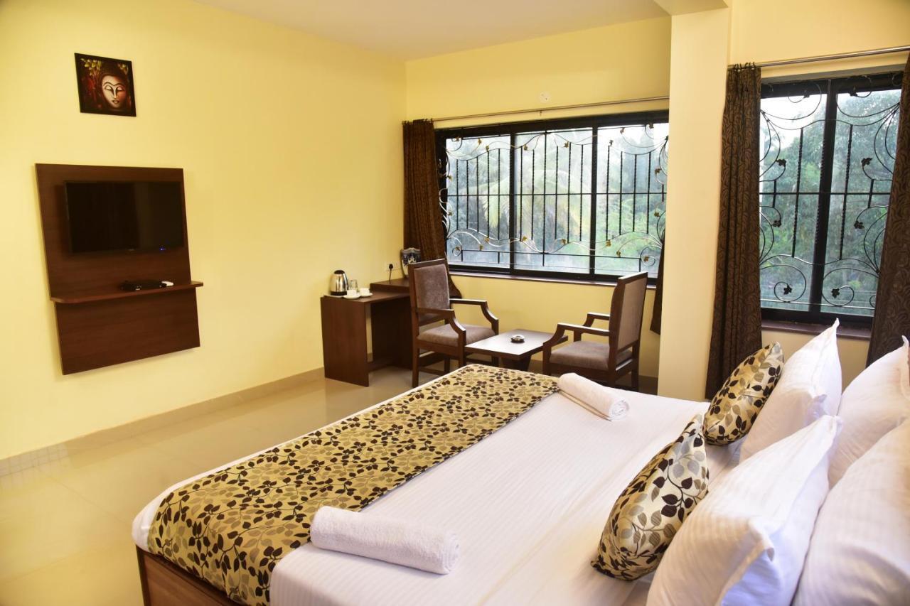 Candolim Grande Resort Bagian luar foto