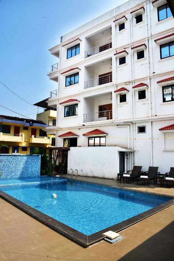 Candolim Grande Resort Bagian luar foto
