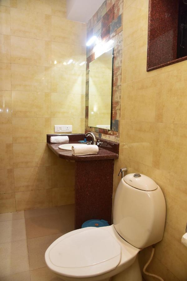 Candolim Grande Resort Bagian luar foto