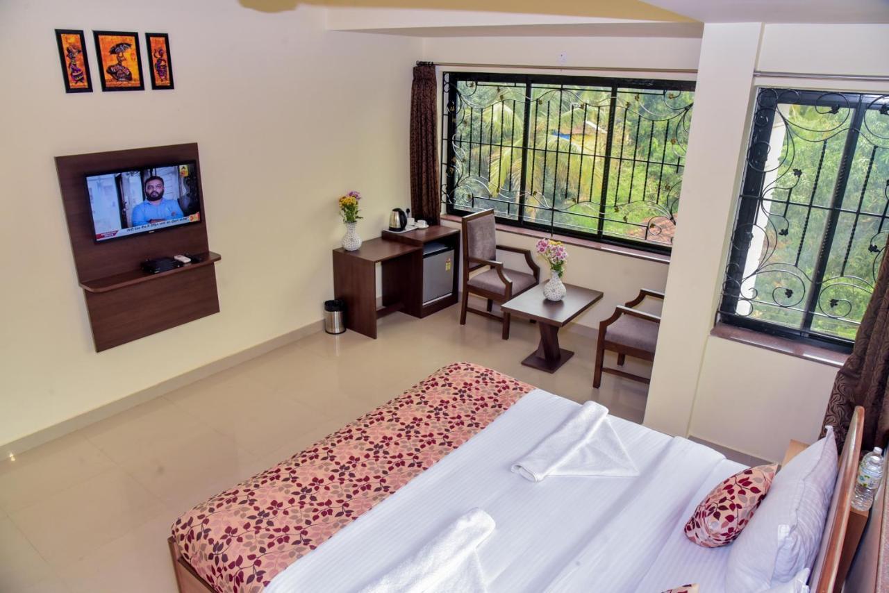 Candolim Grande Resort Bagian luar foto