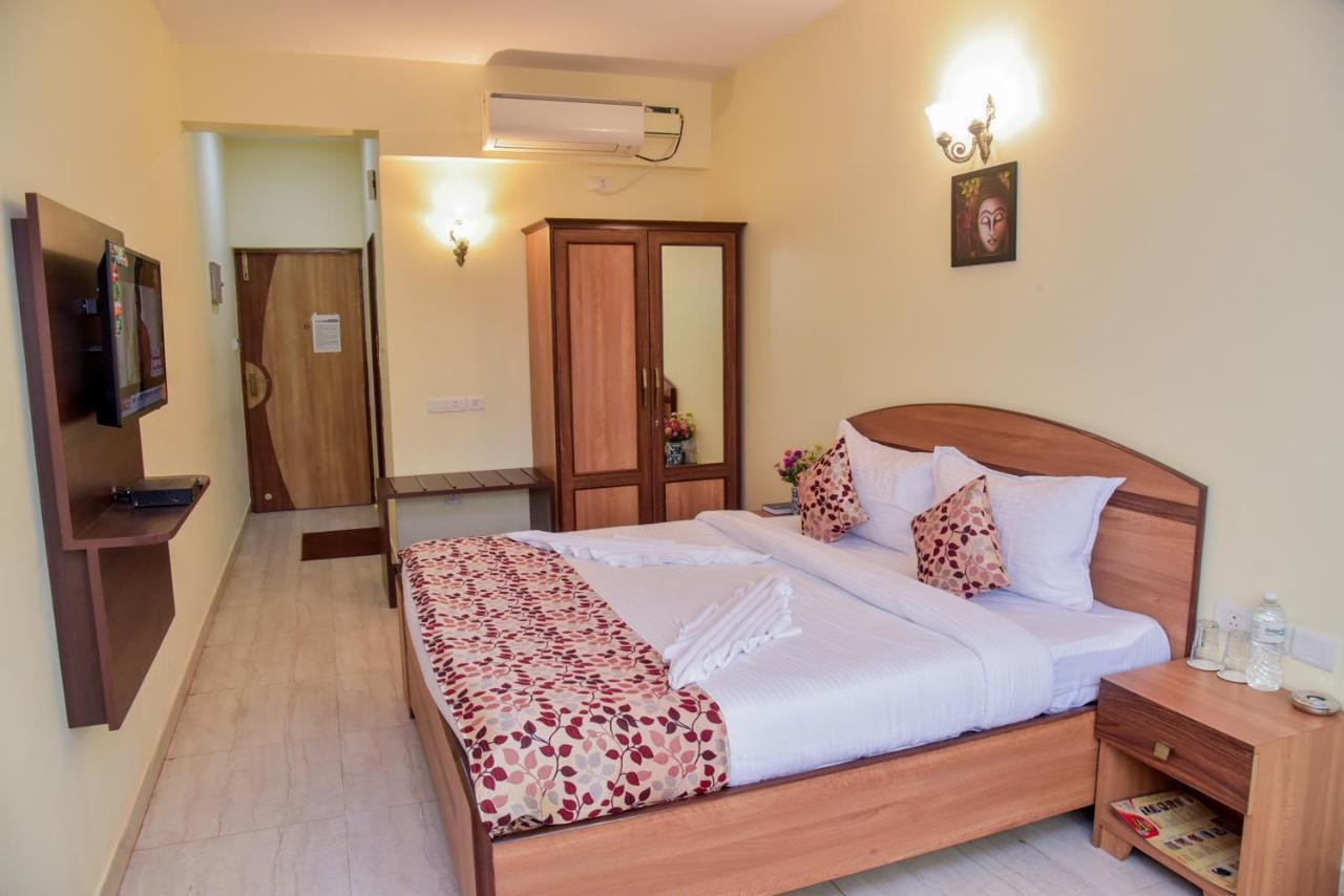 Candolim Grande Resort Bagian luar foto