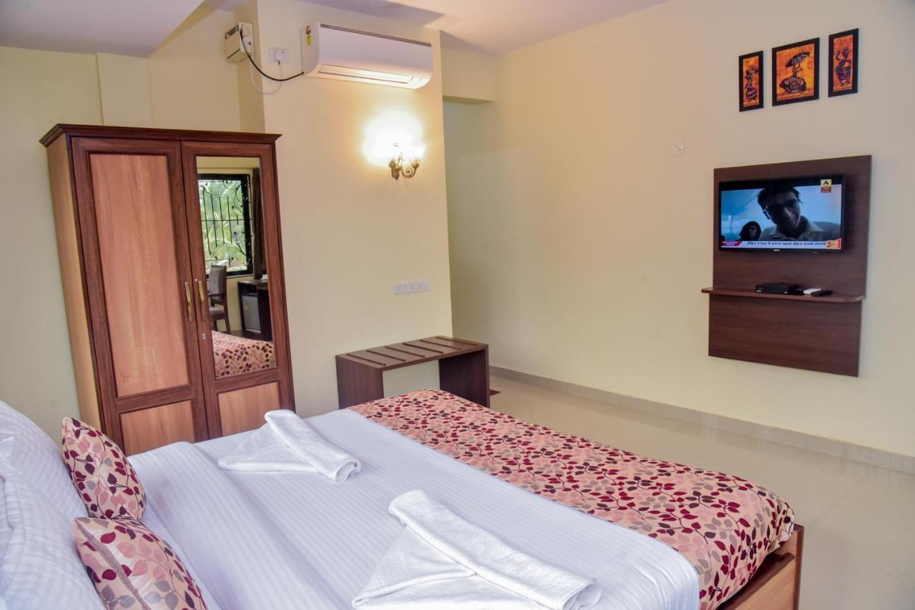 Candolim Grande Resort Bagian luar foto