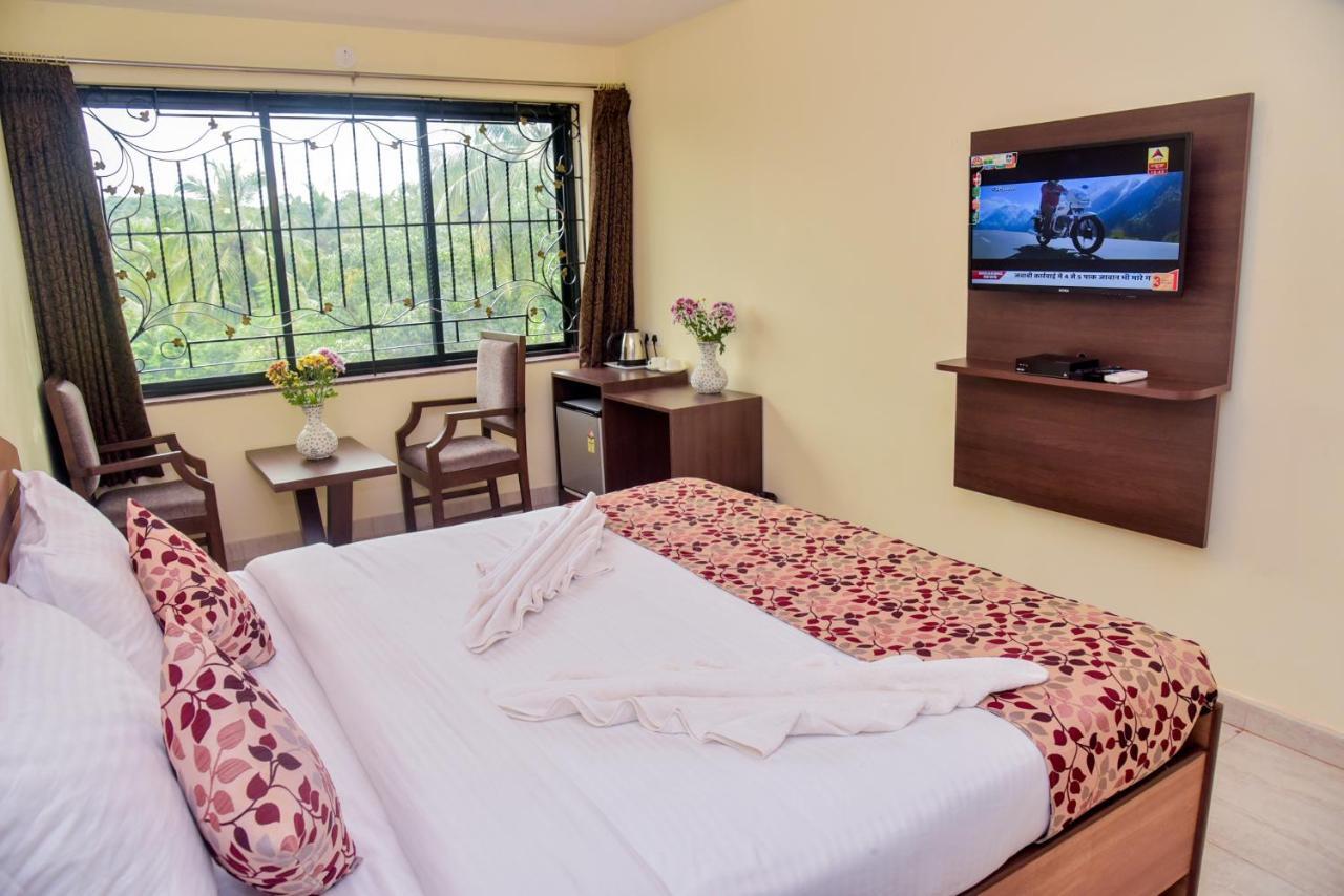Candolim Grande Resort Bagian luar foto