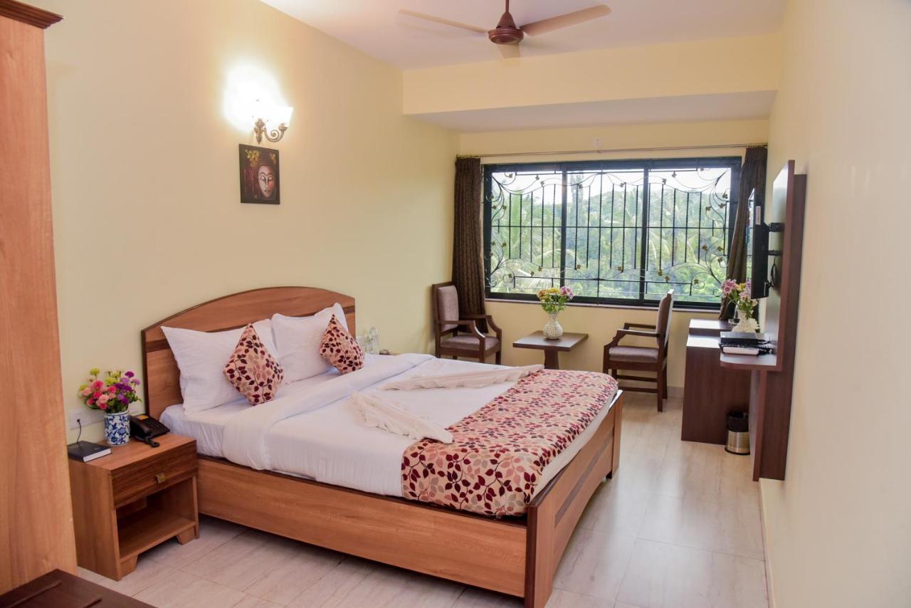 Candolim Grande Resort Bagian luar foto