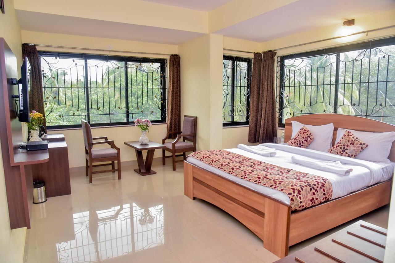 Candolim Grande Resort Bagian luar foto