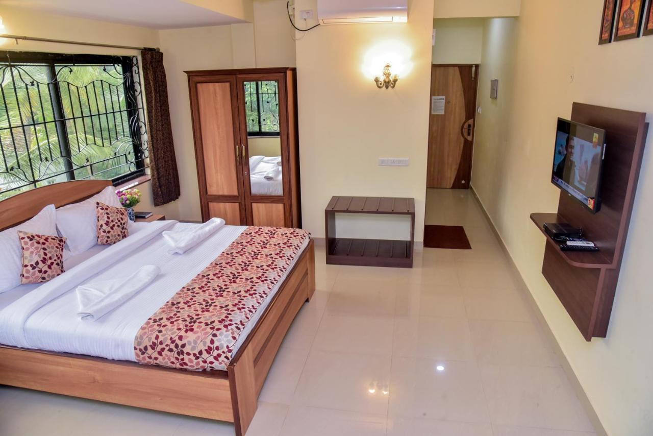 Candolim Grande Resort Bagian luar foto