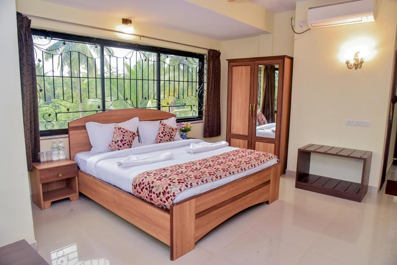 Candolim Grande Resort Bagian luar foto