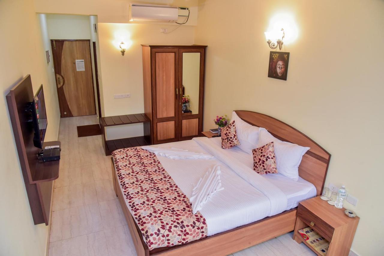 Candolim Grande Resort Bagian luar foto