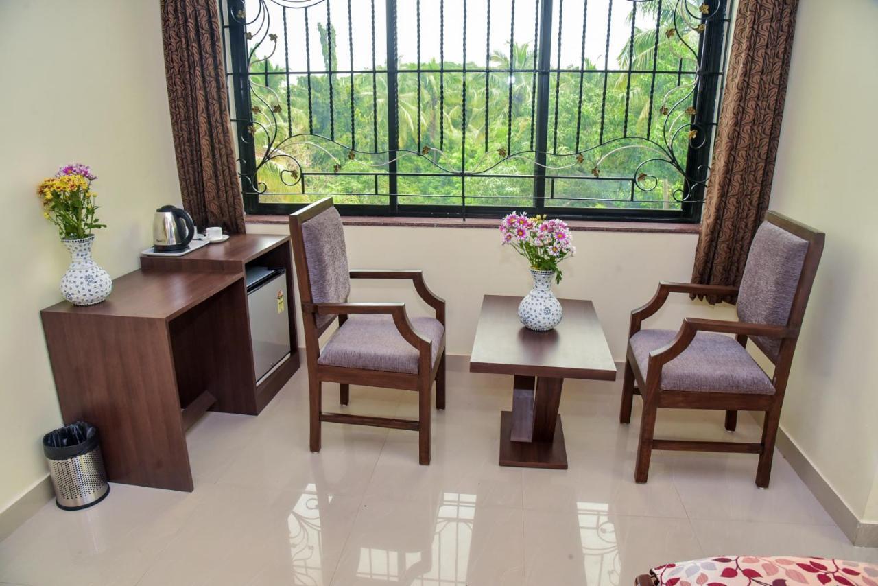 Candolim Grande Resort Bagian luar foto